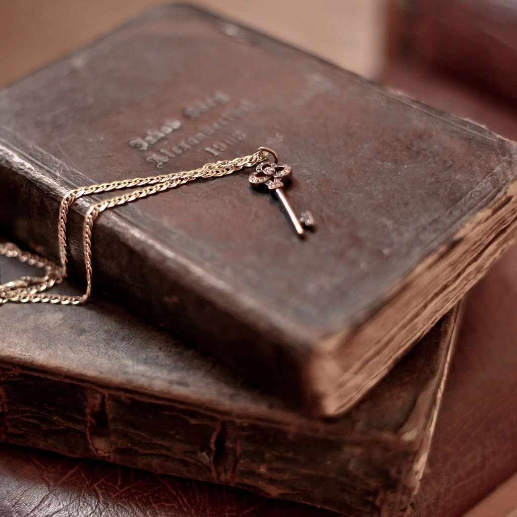 A still life of devotional objects arranged on linen.